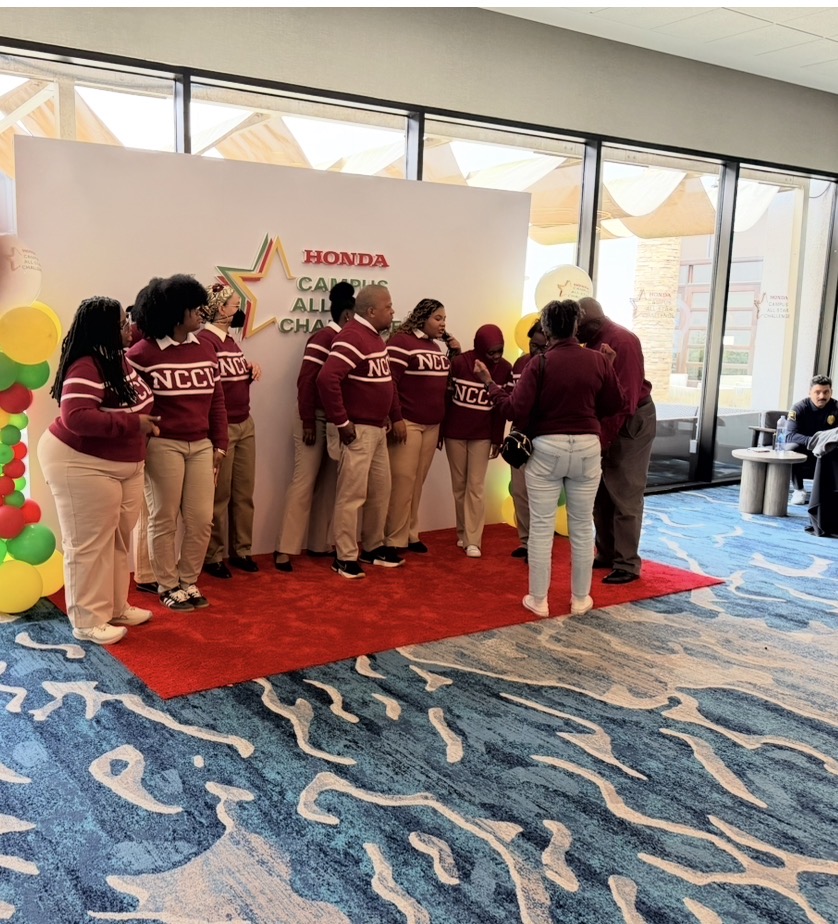 NCC step team performing in front of Honda Campus All-Star Challenge backdrop with balloon columns and red carpet